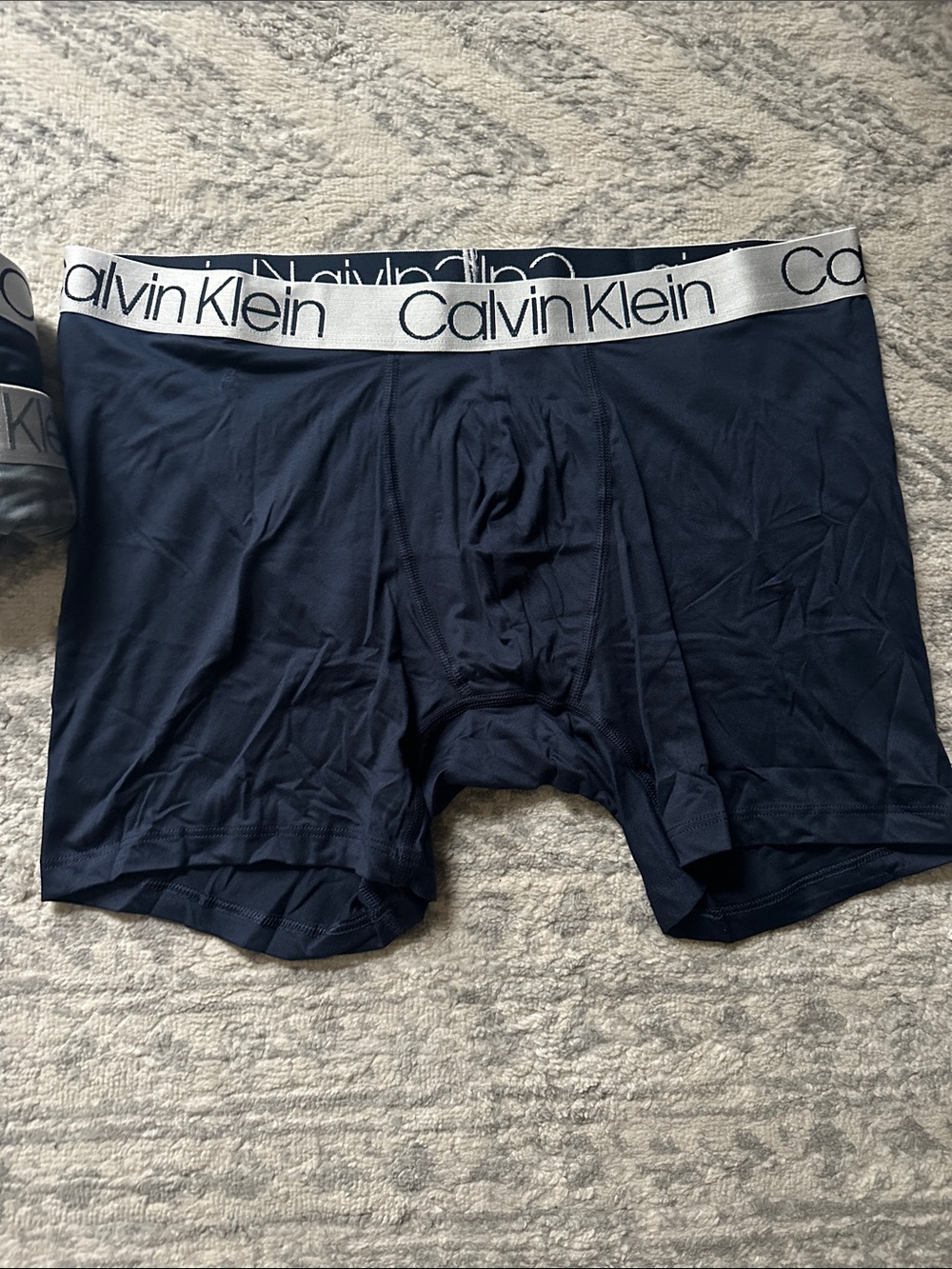Calvin Klein Men's Navy Boxer Briefs with Silver Logo Band